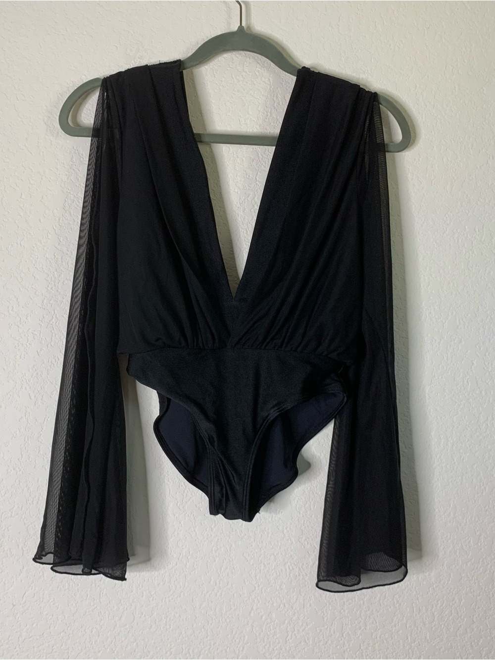 Entreaguas Womens black plunging v neck one piece swimsuit with sheer LS S